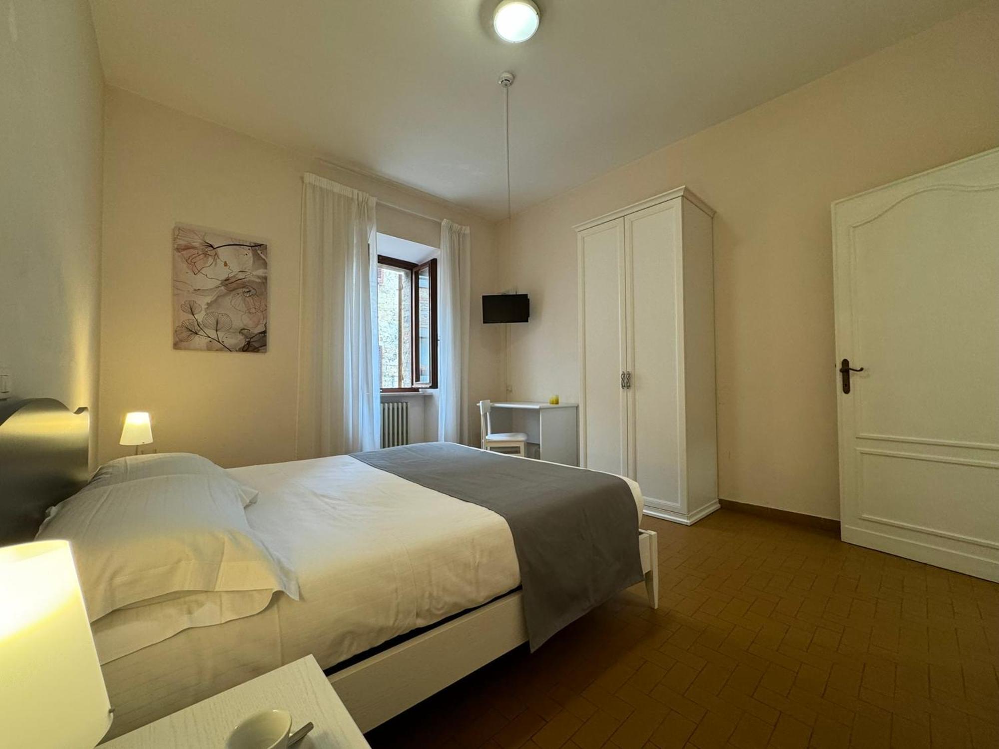 Отель Monastero Ss. Annunziata Тоди Экстерьер фото A room at the hotel