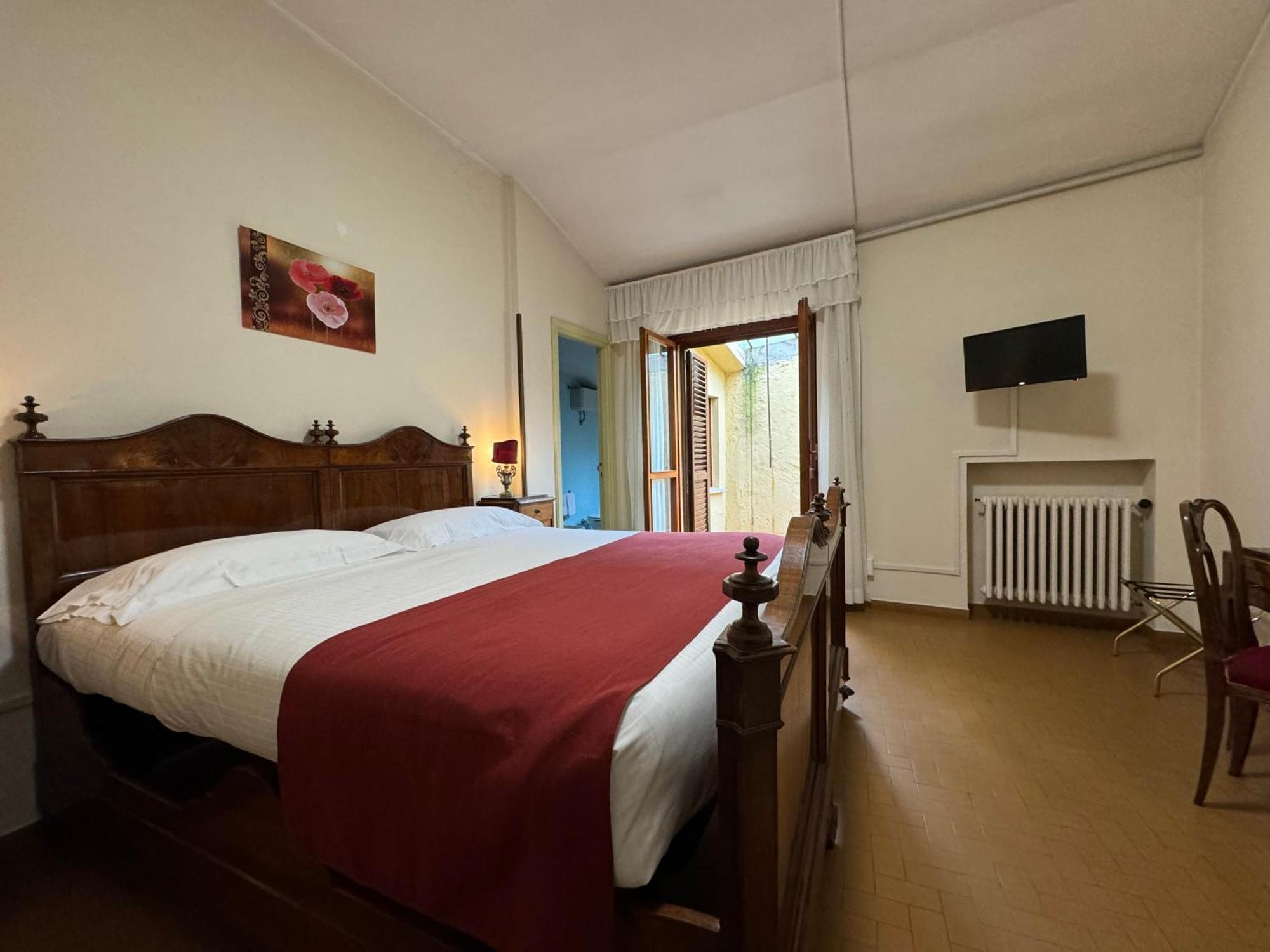 Отель Monastero Ss. Annunziata Тоди Экстерьер фото A room at the hotel