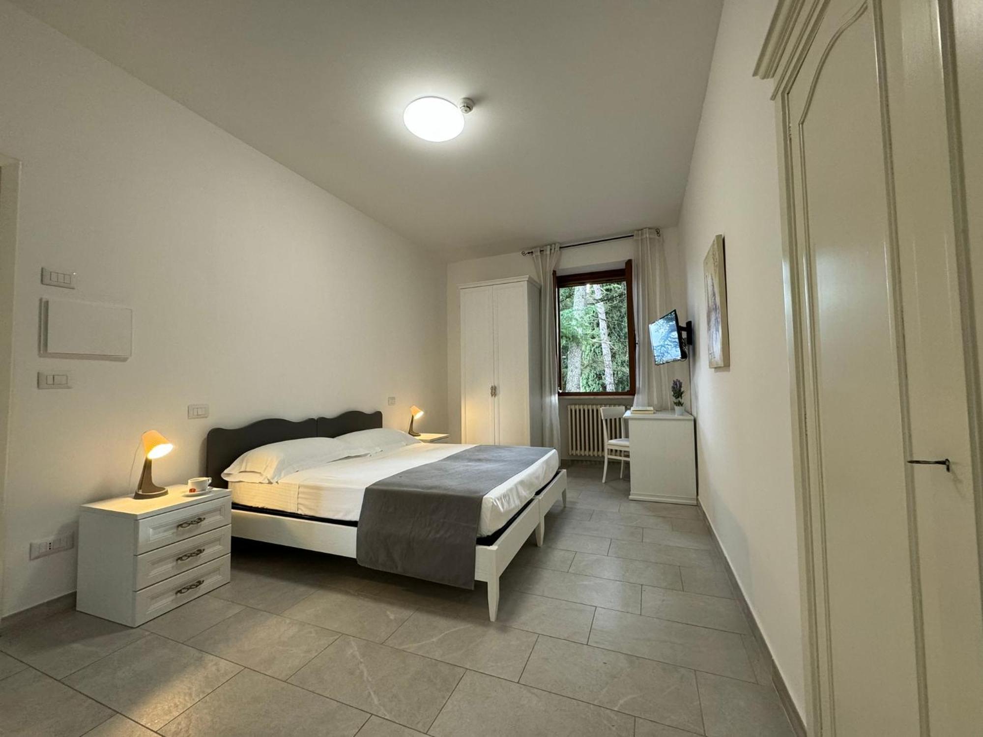 Отель Monastero Ss. Annunziata Тоди Экстерьер фото A room at the hotel