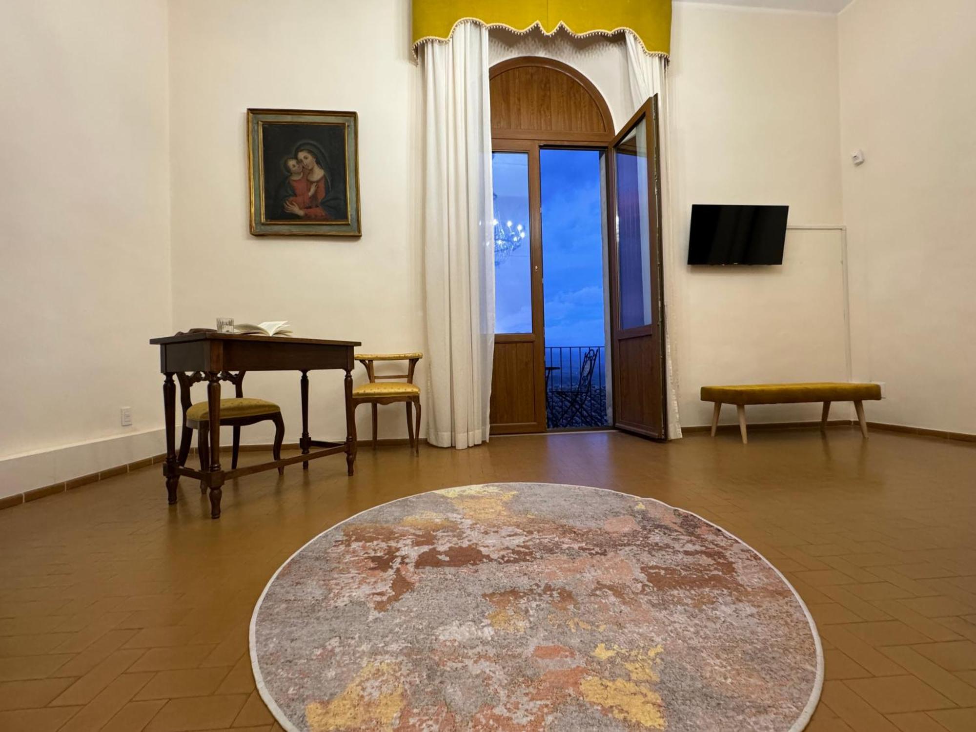 Отель Monastero Ss. Annunziata Тоди Экстерьер фото The Moon Room