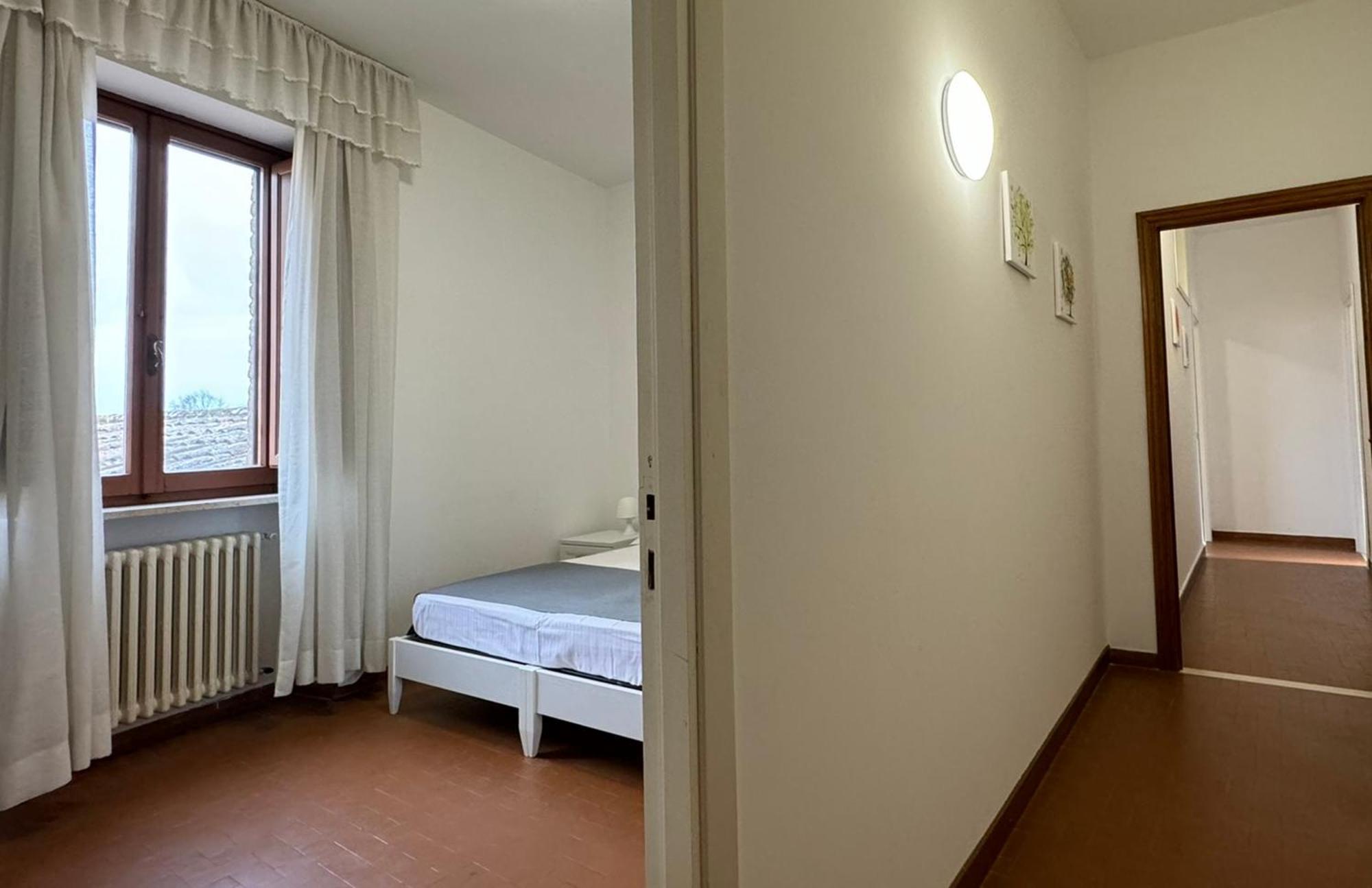 Отель Monastero Ss. Annunziata Тоди Экстерьер фото A typical bedroom in the residence halls